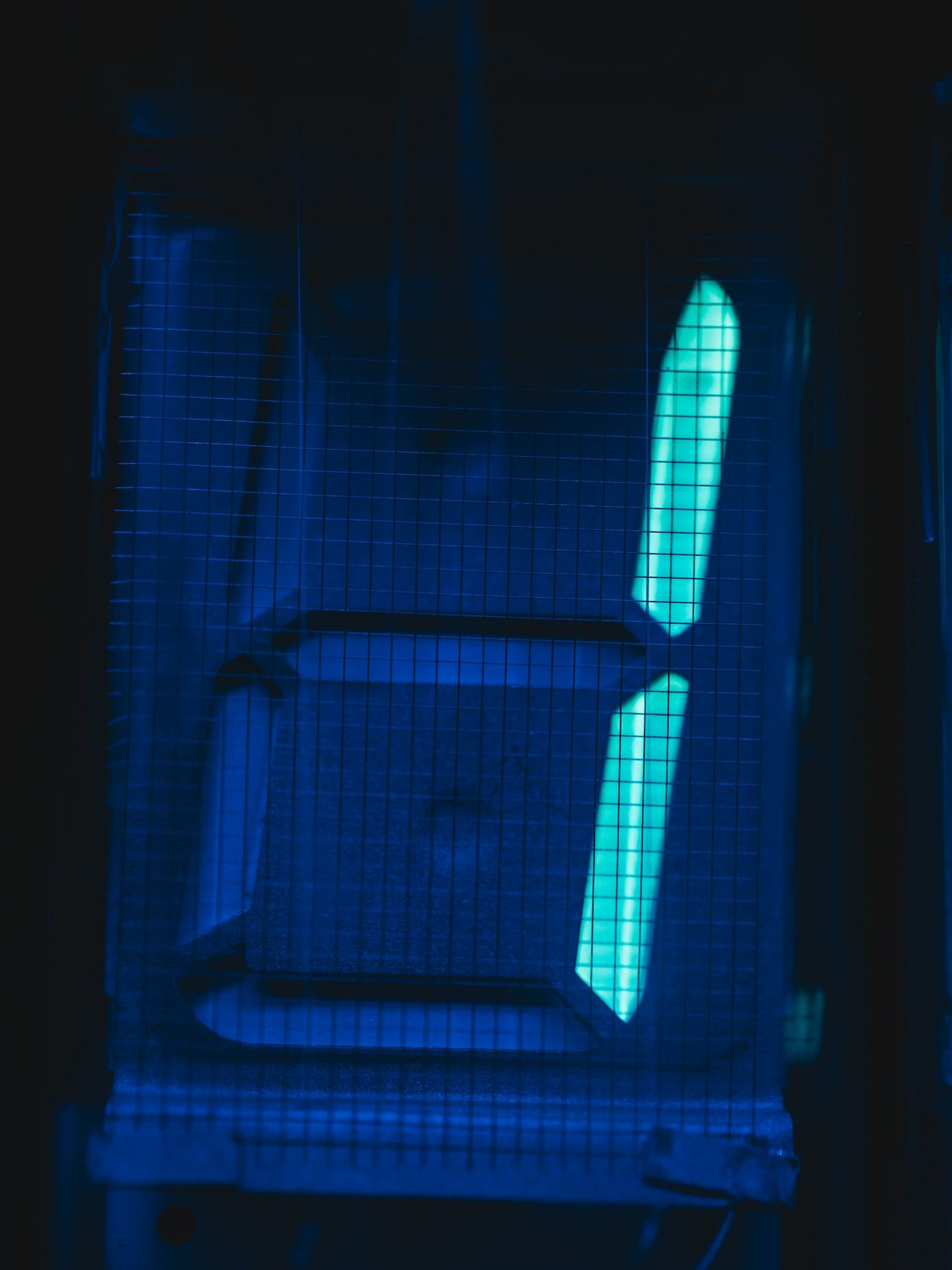 A glowing number four, shown in blue.